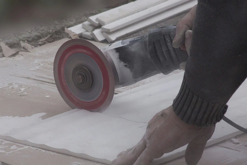 How Can I Make Clean Cuts in Porcelain Tile for Outlet Openings