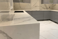//imrorwxhrpkoli5q.ldycdn.com/cloud/lobpmkjolpsrillnpimjojp/can-porcelain-carrara-marble-slabs-be-ed-for-kitchen-coucoettops.jpg