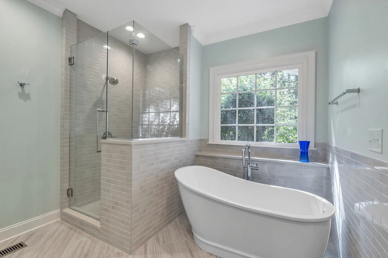 Should You Choose Porcelain Slabs Or Tile for Your Shower Remodel.jpg